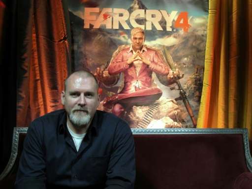 &quot;Far Cry 4&quot; video game executive director Dan Hay pictured in front of a poster for the Ubisoft title in San Francisco