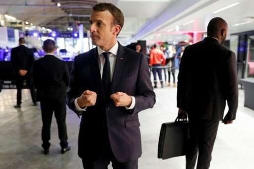 &quot;Without much stronger mobilisation, a jolt to our means of production and development, we will not succeed,&quot; Macron w