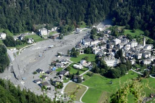 Several villages have been evacuated and many houses destroyed by landslides in the Swiss Alps this summer