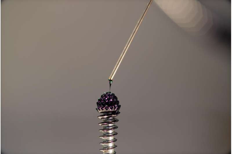 Spiky ferrofluid thrusters can move satellites
