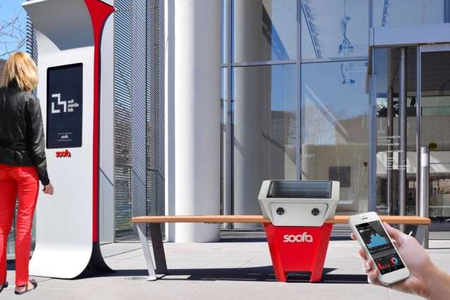 Startup brings solar-powered, phone-charging park benches and digital signs to cities worldwide