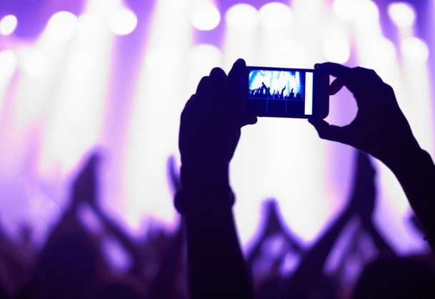 Taking photos of experiences boosts visual memory, impairs auditory memory