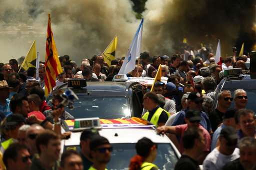 Taxis strike across Spain to protest Uber, Cabify services