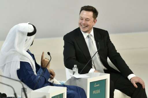 Tesla CEO Elon Musk (right) with Mohammad al-Gergawi, UAE Minister of Cabinet Affairs and Future, at the World Government Summit