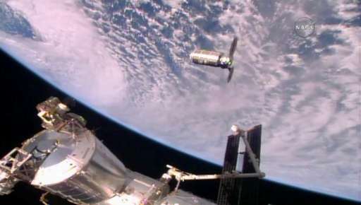 The Cygnus resupply ship slowly approaches the International Space Station in October 2016