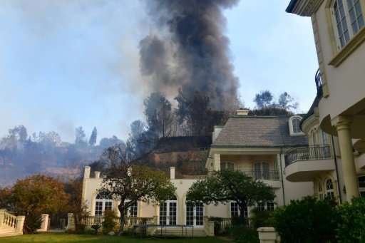The luxurious multi-million homes in Bel-Air are threatened by the Skirball Fire, a blaze that destroyed 200 hectares (500 acres