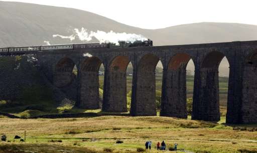The Peppercorn Class A1 60163 Tornado steam train travels over the Ribblehead Viaduct in Ribblehead, nortern England, for the fi