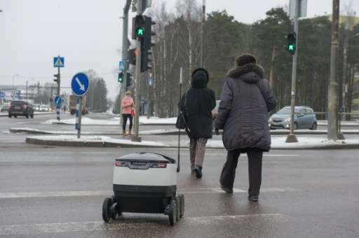 The robot can communicate with humans when it needs to cross the street or gain access to a building
