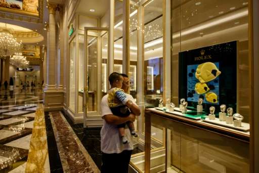The Rolex watches for sale in the Parisian Casino resort can cost many times the monthly wages of Macau locals