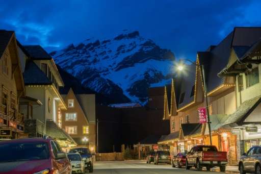 The town of Banff at dusk. Conservationists fear rapidly increasing numbers of visitors could be a risk for Canada's national pa