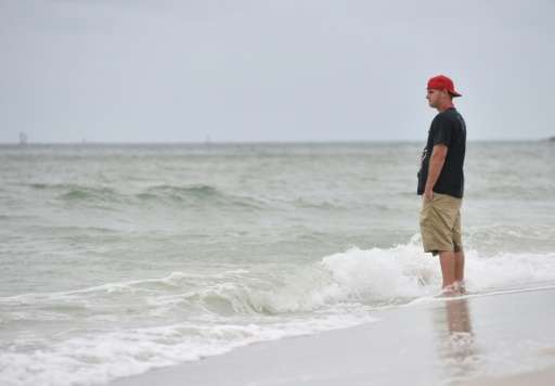 The white-sand beaches of Naples, Florida stood near-deserted as Hurricane Irma closed in