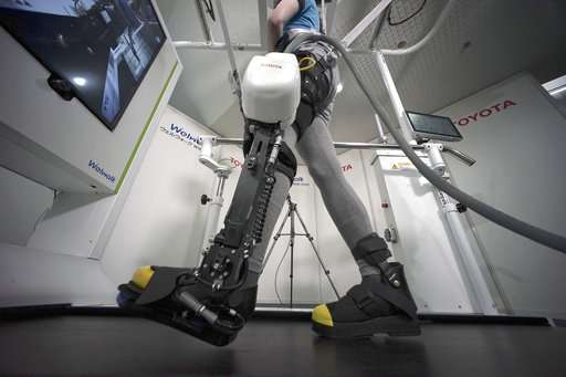 Toyota shows robotic leg brace to help paralyzed people walk