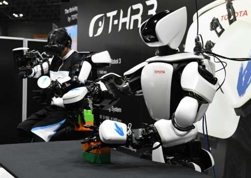 Toyota's T-HR3 can be controlled by a wearable system that allows users to operate the entire robot in real-time by simply movin