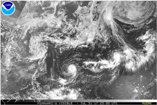 Typhoon weakens but could still threaten Japan
