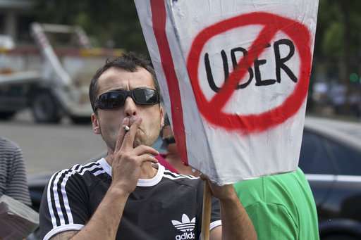 Uber's airport service in Madrid under attack from town hall
