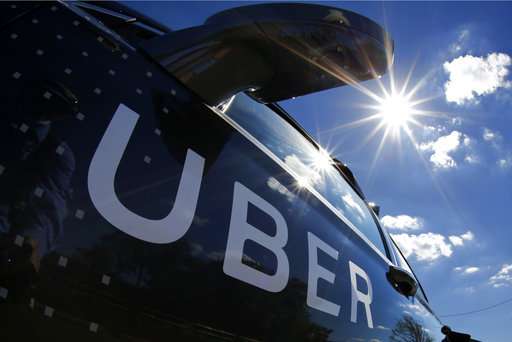 Uber trial on trade secrets delayed as federal probe emerges