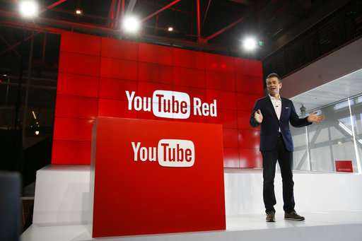 YouTube reverses some restrictions on gay-themed content