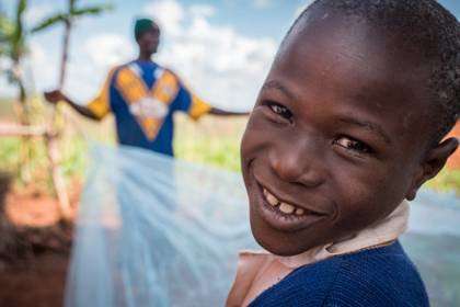 A plan to distribute insecticide-treated bed nets annually to children in schools