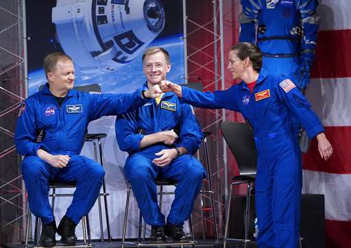Astronauts picked for SpaceX, Boeing capsule test flights