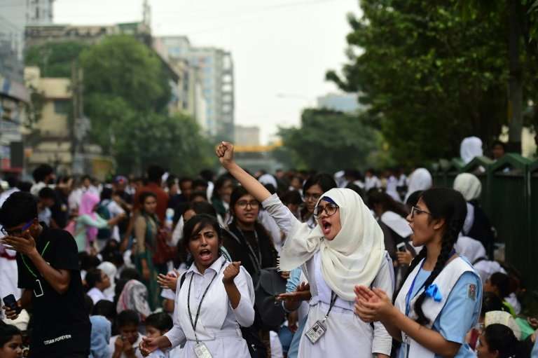 Bangladeshi students are protesting poor road safety after two teens were killed by a speeding bus
