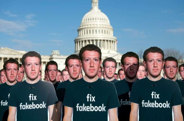 Cardboard cutouts of Facebook founder and CEO Mark Zuckerberg outside the US Capitol ahead of his testimony before Congress
