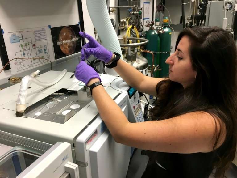 French post-doctorate researcher Maeva Millan at work at NASA's Goddard Space Center in Greenbelt, Maryland