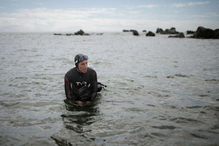 French swimmer Ben Lecomte faces a gruelling six month swim through shark-infested waters