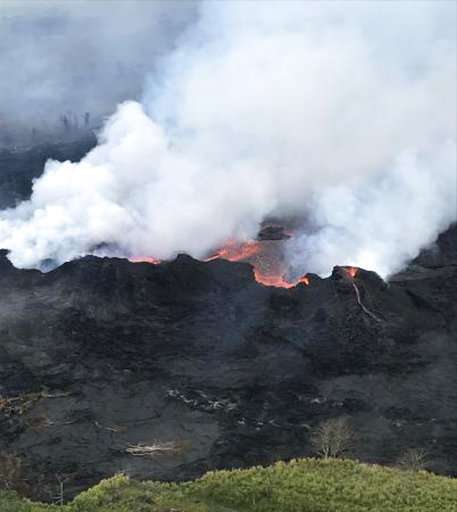 Hawaii lava crosses key highway, destroys utility poles