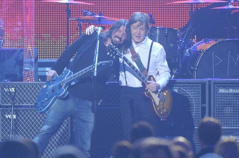 Music legend Paul McCartney (R with Dave Grohl) as well as major music labels and film studios have lobbied politicians urging t