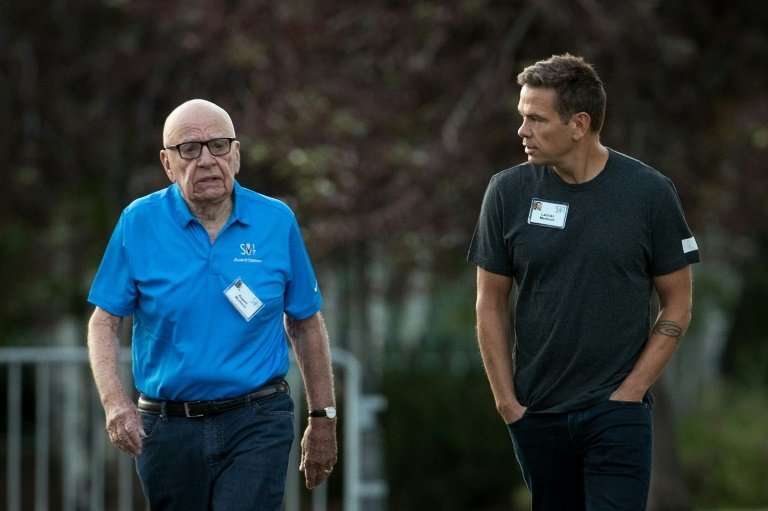 Rupert Murdoch and son Lachlan Murdoch, seen at a conference in 2017, share the title of executive chairman at News Corp, the ne