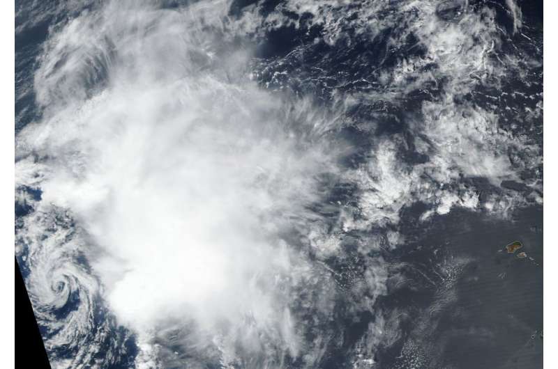 Satellite finds wind shear battering Tropical Storm Nadine