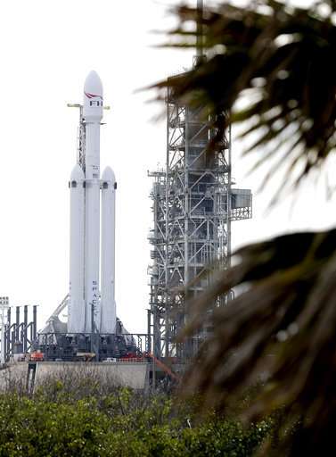 Showtime for SpaceX's big new rocket with sports car on top