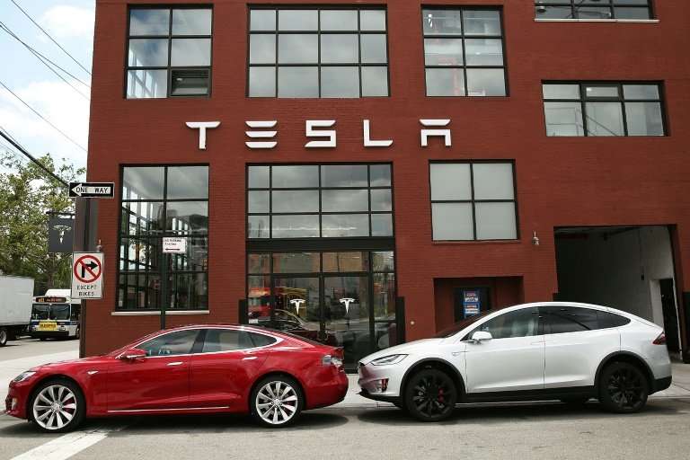 Tesla, which has seen strong demand for its electric cars, is ramping up efforts to become a mainstream producer