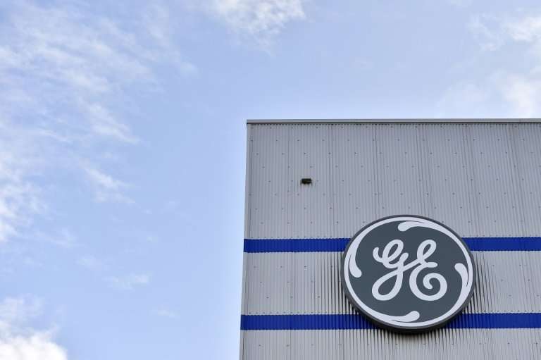 Troubled US industrial giant GE reports a $22.8 billion third quarter loss as it writes down assets as part of a turn-around bid