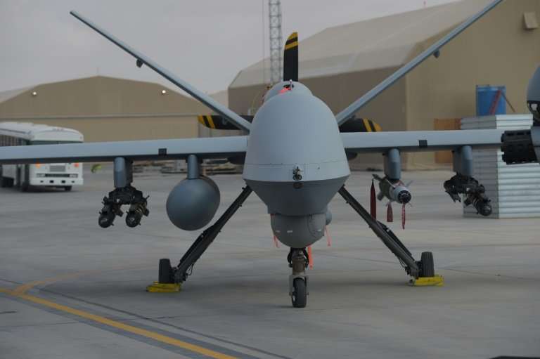 US officials say American firms are losing sales of armed drones like the MQ-9 Reaper—seen here on an air base in Afghanistan—to