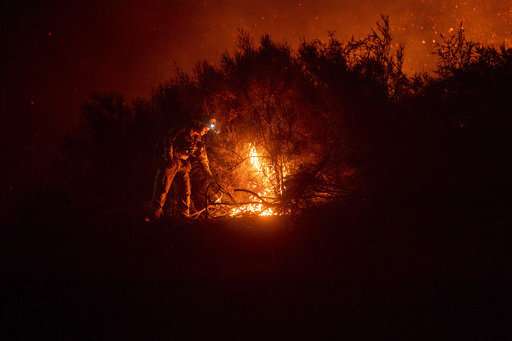 Battling 18 blazes, California may face worst fire season