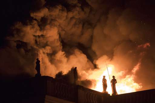 Firefighters try to save relics as fire engulfs Rio museum