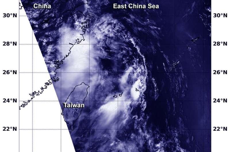 NASA finds Tropical Depression 13W hugging southeastern coast
