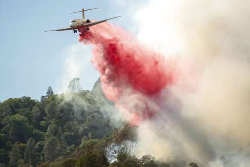 14,000 firefighters battling 18 major California blazes