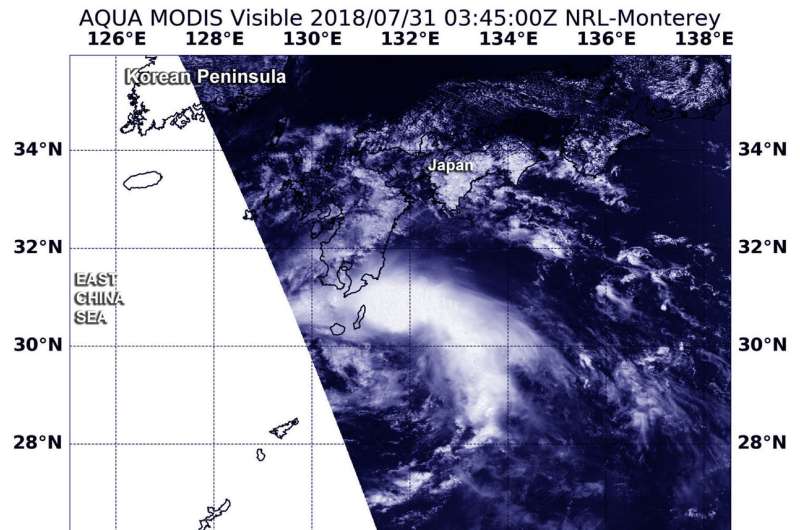 NASA finds Tropical Storm Jongdari now comma shaped