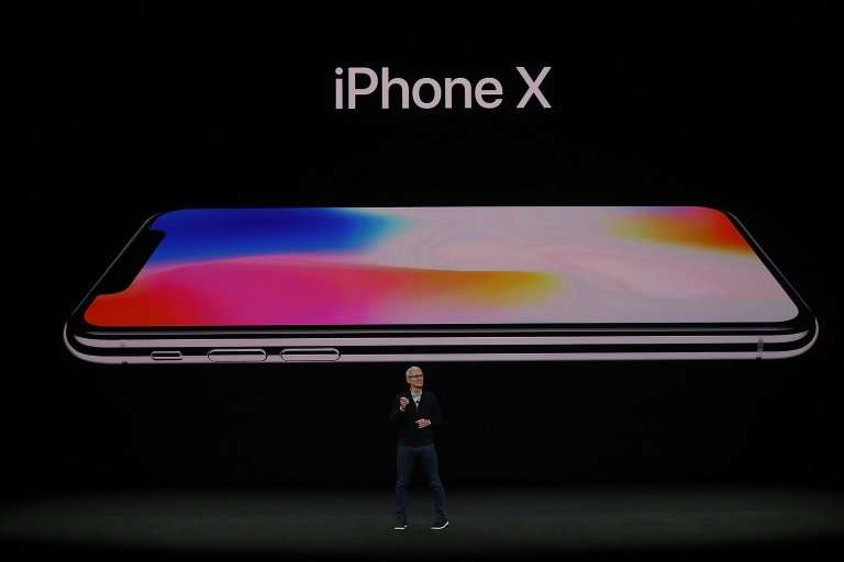 Apple CEO Tim Cook announces the new iPhone X during an event at the Steve Jobs Theatre on the Apple Park campus on September 12