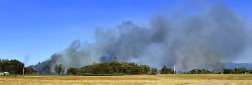 Growing fire shows potential for explosive Northwest season