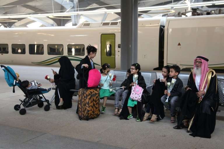 Passengers wait at Mecca train station on October 11, 2018 as Saudi Arabia's new high-speed railway opens