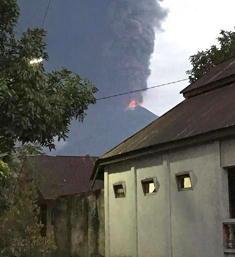 Volcano erupts on same Indonesian island as earlier quake