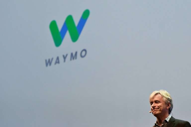 Waymo CEO John Krafcik, whose firm is competing with rival Uber in development of self-driving vehicles