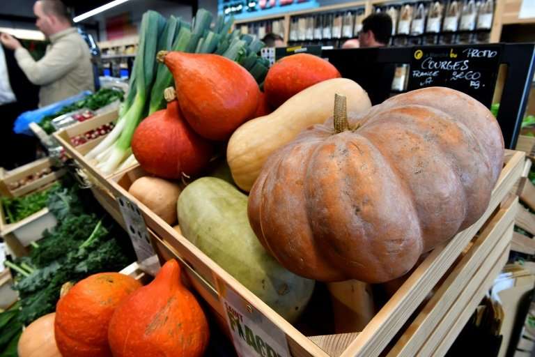 Consumption of organic produce, like these at an organic supermarket in western France, is on the rise, but can scientists reall