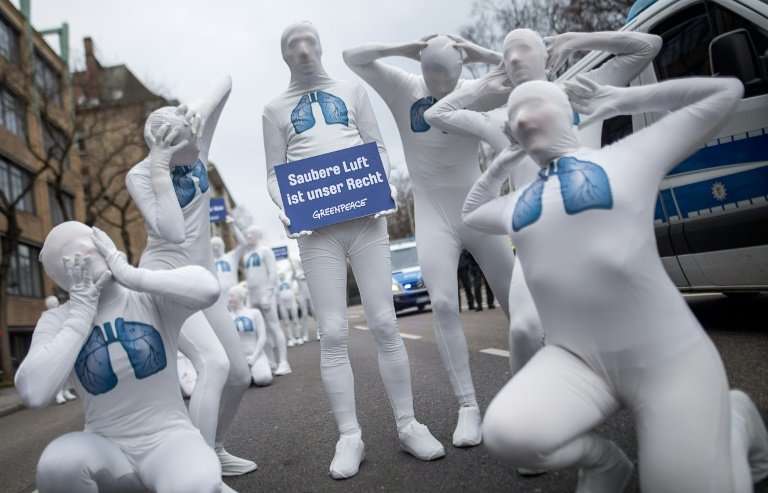 Greenpeace activists wearing white morphsuits with lungs painted on them demonstrated for clean air in Stuttgart in February. Th