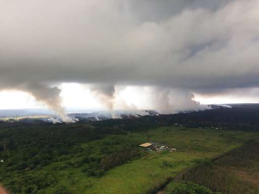 Quakes damage roads as ash spews from Hawaii volcano