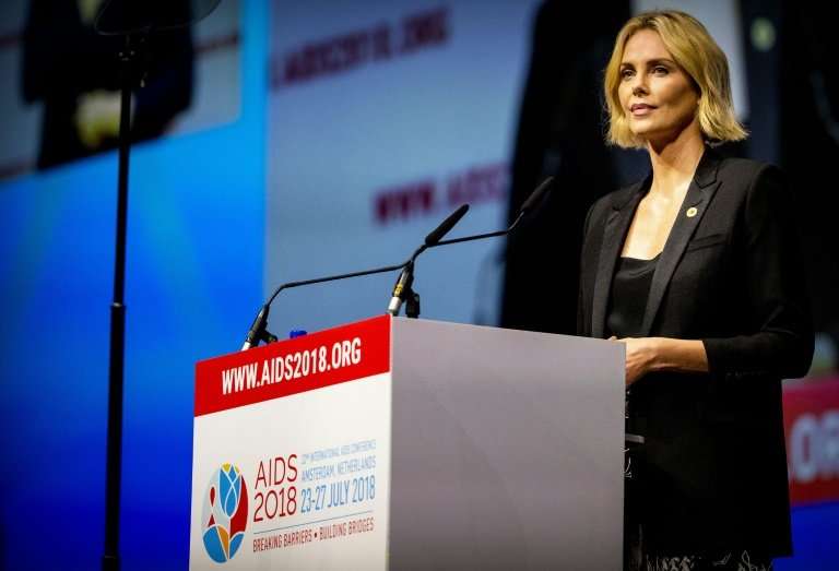 South African actress Charlize Theron speaks at the 22nd International AIDS conference in Amsterdam