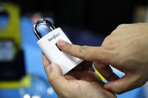 The Latest: Autos overshadow the small at CES tech show